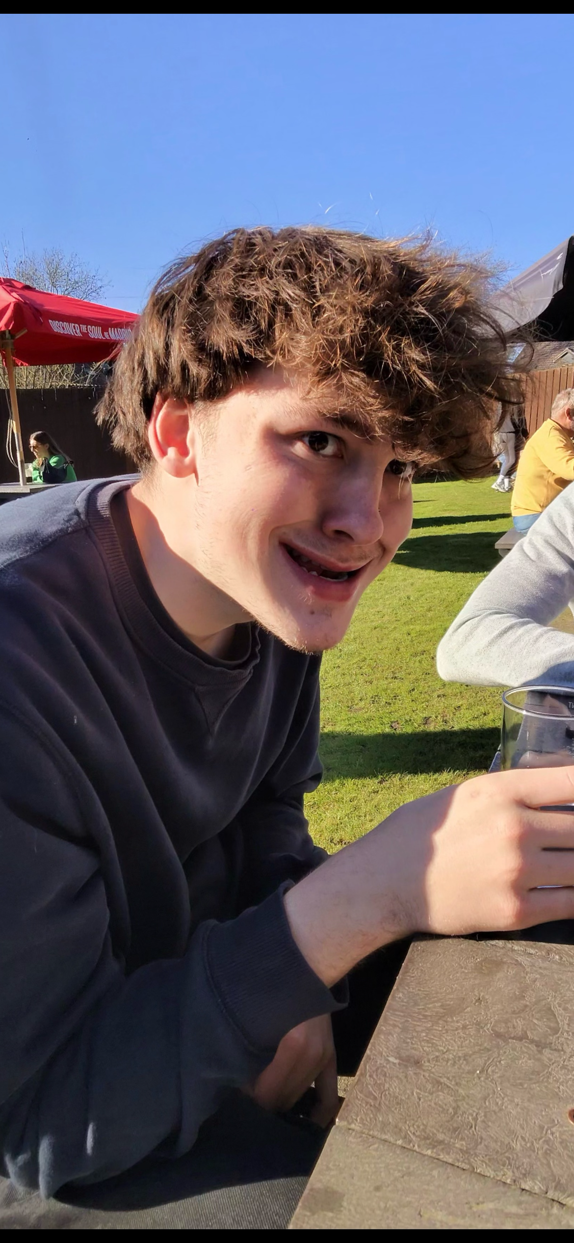 Pal leaning toward the camera outside